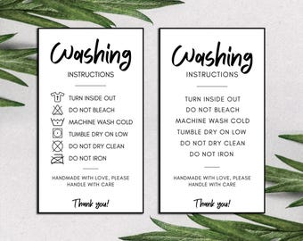 May include: Two black and white cards with washing instructions. The cards have a handwritten font and include a list of instructions such as "Turn inside out", "Do not bleach", "Machine wash cold", "Tumble dry on low", "Do not dry clean", and "Do not iron". The cards also include the text "Handmade with love, please handle with care" and "Thank you!"
