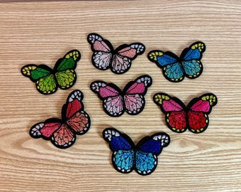 Embroidered Butterfly Sewing Patches. Pack of 7 in blue, green, pink and red.