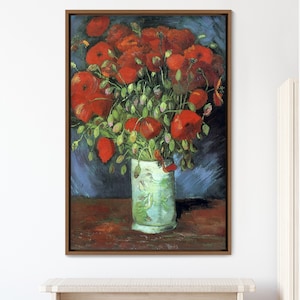 May include: A painting of a vase filled with red poppies. The vase is white with a green design and is sitting on a wooden table. The background is a dark blue.