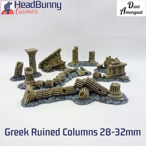 May include: A collection of miniature Greek ruined columns in various states of disrepair. The columns are primarily tan and gray, with detailed architectural features. The text "Greek Ruined Columns 28-32mm" is displayed at the bottom of the image.