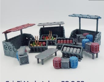 May include: A collection of miniature sci-fi marketplace terrain pieces including three stalls with roofs, a table, and various crates and barrels in red, blue, and grey. The set includes text reading HeadBunny Games, Ill Gotten Games, and Sci-Fi Marketplace 28 & 32mm.