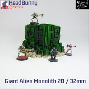 May include: A green 3D printed alien monolith with a geometric design. The monolith is 28/32mm and is suitable for tabletop gaming.  The monolith is surrounded by four miniature figures.