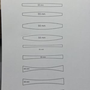 May include: A printed template labelled "Ring Shank Template | Tapered 1" showing ring shank designs. Each design is marked with "55 mm" (approximately 2.17 inches), indicating the shank length.