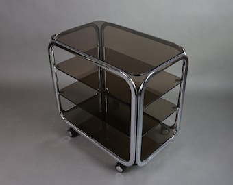 1980er Jahre Rauchglas Beistelltisch | Chrom Rolltisch | Vintage Deutsches Design Möbel | Mid-Century Modern Couchtisch