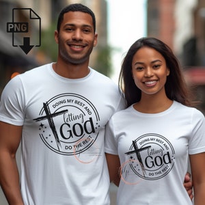 May include: Two people wearing white t-shirts with a black graphic design. The design includes a cross, the words "DOING MY BEST AND" and "letting God DO THE REST" in a circular arrangement.