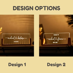 Pode incluir: S&atilde;o exibidas duas placas retangulares iluminadas em acr&iacute;lico com bases de madeira. O design 1 apresenta os nomes "michael & barbara" e a data "05.22.2022". O design 2 mostra "michael & fiona" com "October 18" e "EST. 2021".