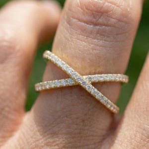 Puede incluir: Un letrero de madera r&uacute;stica con el texto "Welcome to our home" en letras blancas. El letrero presenta un acabado envejecido y un dise&ntilde;o sencillo y acogedor, perfecto para la decoraci&oacute;n de la entrada.