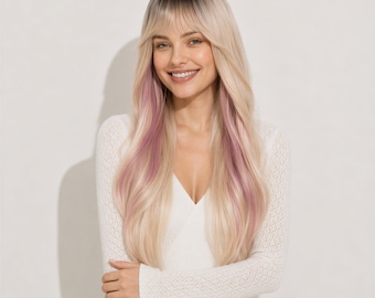 May include: A long, wavy wig featuring a rooted blonde base with soft, light pink highlights throughout the lengths. The hair is styled with straight-cut bangs that frame the forehead, transitioning into loose, flowing waves that reach the chest.