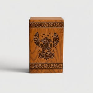 "The Tree of Life Memorial Urn: A beautiful and symbolic tribute, handcrafted from rich Sheesham wood to honor a life's journey."