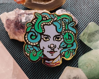 Medusa Glow in The Dark enamel pin badge in gold, mythological creature, mythology, feminist, snakes, goth, witchy, dark occult aesthetics