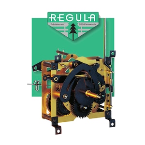 May include: A gold-colored clock mechanism with black gears and a green background. The text "REGULA Präzision von SBS-Feintechnik" is visible in the top left corner.