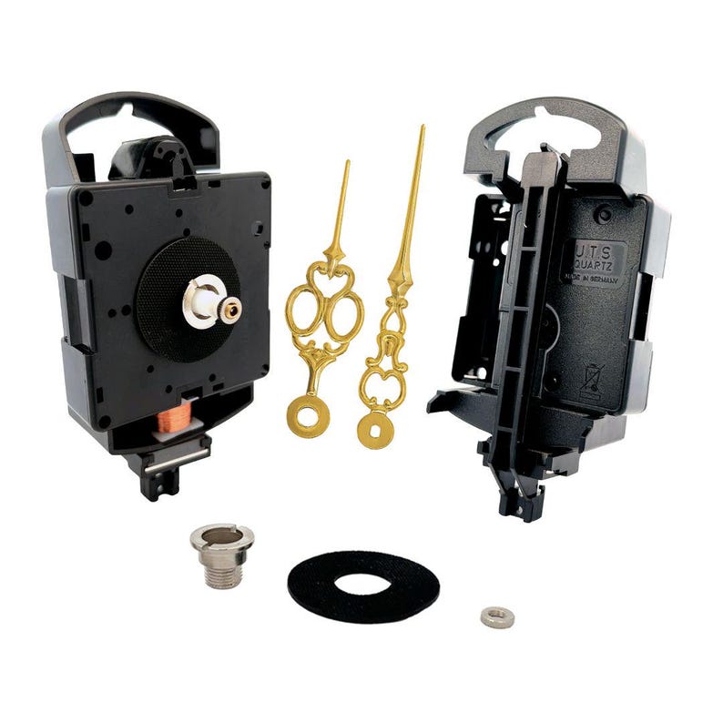 May include: A black quartz clock movement kit with gold-colored hands. The kit includes a clock movement, two hands, a mounting bracket, a washer, and a nut.