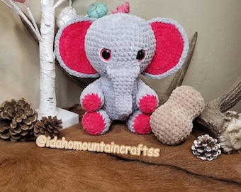 Crochet hatching elephant with a peanut, stuffed elephant plushie