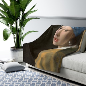 Manta polar &quot;La joven de la perla&quot; de Johannes Vermeer: ¡arte, historia y comodidad de los maestros holandeses en un solo diseño! Manta Vermeer
