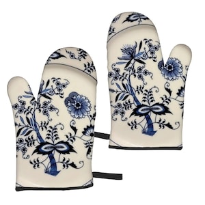 May include: A pair of white oven mitts with a blue and white floral pattern. The mitts have a black trim around the edges.