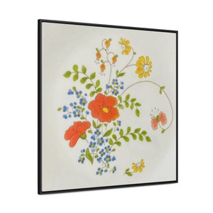 May include: A framed painting of a floral arrangement with red, orange, yellow, and blue flowers. The flowers are painted on a white background.