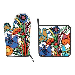 May include: A pair of colorful oven mitts with a floral and bird design. The mitts are white with red, blue, yellow, green, and orange accents. The design features stylized birds and flowers.