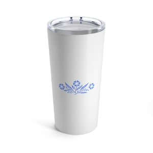 May include: White stainless steel tumbler with a blue floral design. The design features three stylized flowers with leaves.