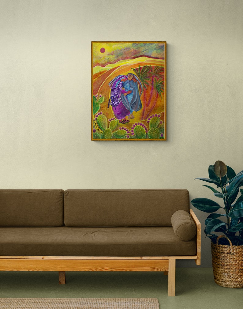 May include: A painting depicting two figures in colourful clothing walking through a desert landscape with cacti and a large red sun in the sky.