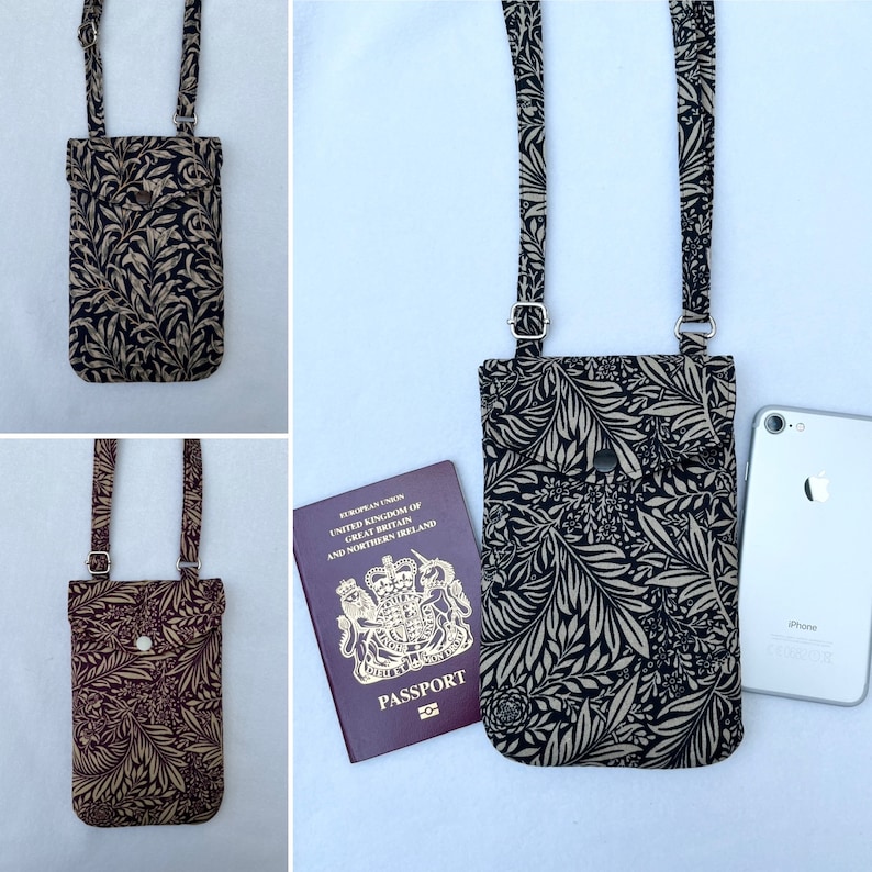 May include: A black and white floral patterned phone pouch with a zippered pocket and adjustable strap. The pouch is shown with a passport and a smartphone.
