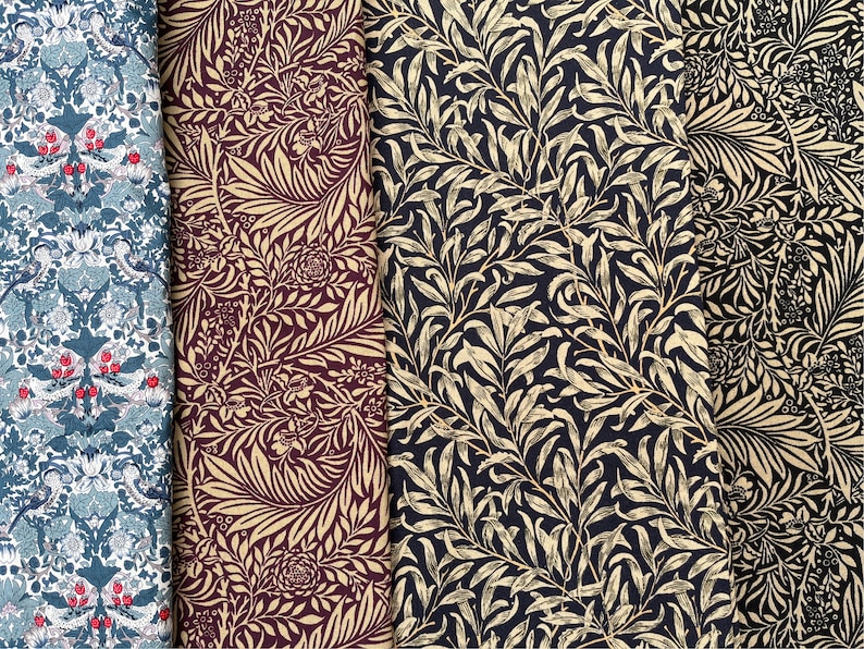 May include: Four fabric swatches with different floral patterns. The first swatch is a dark blue fabric with a white and red floral pattern. The second swatch is a burgundy fabric with a gold floral pattern. The third swatch is a dark blue fabric with a gold floral pattern. The fourth swatch is a black fabric with a gold floral pattern.