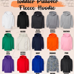 May include: A chart showing 18 different color options for a toddler pullover fleece hoodie. The colors include white, black, black leopard, granite heather, heather, kelly green, natural heather, navy, orange, pink, purple, red, royal blue, vintage camo, and vintage smoke.