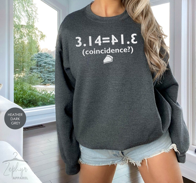May include: Heather dark grey sweatshirt with the text "3.14=PI.E (coincidence?)" and a small pie slice graphic.