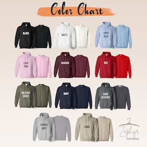 May include: Color chart showing different colors of hoodies and sweatshirts. The colors include black, white, light blue, light pink, maroon, red, military green, navy, dark heather, sports grey, and sand.