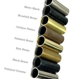 May include: Close-up of eight metal tubes in different finishes, including brushed chrome, matte black, brushed brass, antique patina, polished brass, raw brass, black brass, and polished chrome.