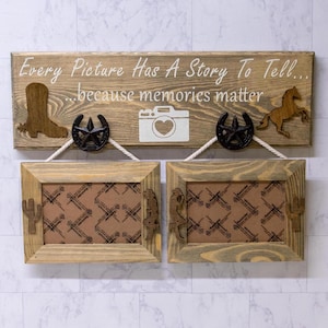May include: Wooden photo frame with two picture slots, a decorative sign with the text "Every Picture Has A Story To Tell... because memories matter", and western-themed accents including a cowboy boot, horse, and horseshoe.