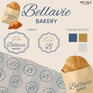 May include: A bakery logo design with the name "Bellavie Bakery" in a stylish script, alongside a croissant illustration. The design incorporates a colour palette of blue, gold, white, and light blue. The image also shows a croissant in a paper bag.