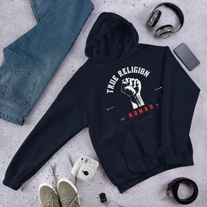 True Religion Human Raised Fist Hoodie, Unisex Black Graphic Sweatshirt, Activist Streetwear, Social Justice Gift, Urban Fashion Pullover