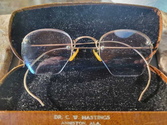 Antique rimless eyeglasses and case