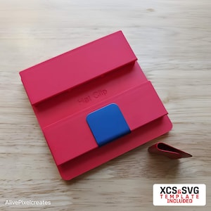 May include: A red plastic hat clip with a blue plastic insert. The clip is labeled "Hat Clip".
