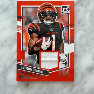 Ja’Marr Chase Donruss Threads Jersey piece card for the Cincinnati Bengals