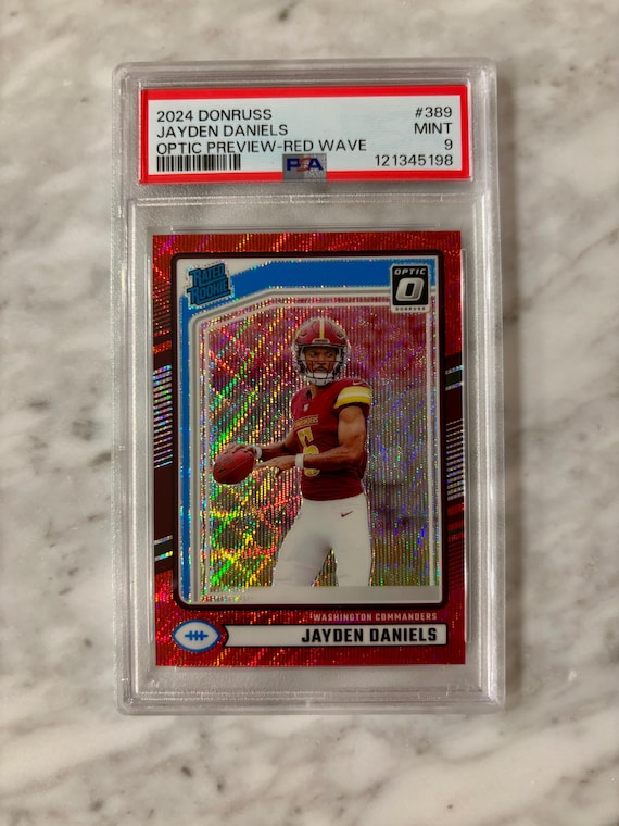 graded jayden daniels rookie cards Jayden Daniels Optic Rookie Card Red Wave Washington Commanders PSA9