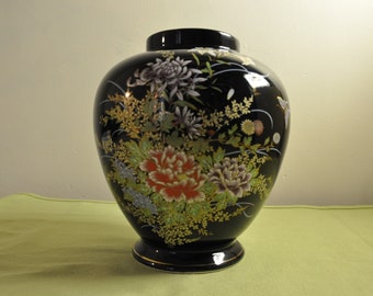 Beautiful Ceramic Vase with black glaze, with flowers and butterflies.