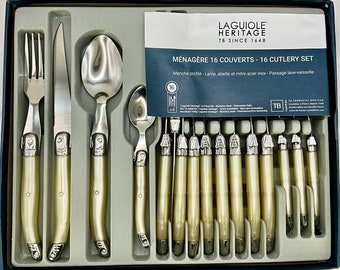 Brand new set of 16 Laguiole Heritage cutlery with a slightly translucent ivory coloured polypropylene handles.