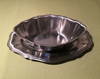 French vintage silver metal gravy dish on tray.