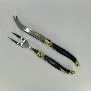 French vintage LAGUIOLE cheese set of 2 including a cheese knife and server fork with blue marble effect coloured polypropylene handles.