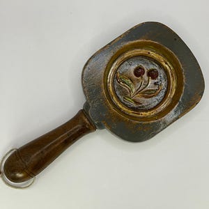 Beautiful French vintage wooden butter mould which has been hand painted to make a wall hanging.