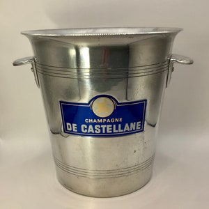 French vintage Champagne de Castellane ice bucket / Seau à Champagne / barware, with traditional flat clam shell handles.