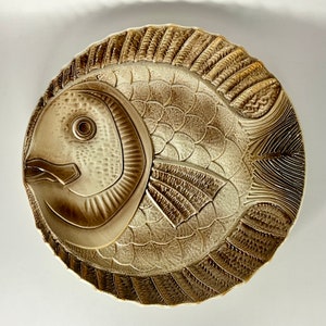 Collectible French vintage Sarreguemines France fish plate and it has a very nice detailed embossed design.