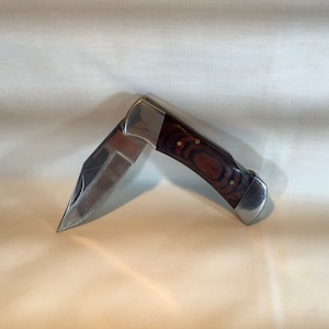 French vintage hand made lock knife well made from silver stainless steel, brass and a polished hardwood handle.