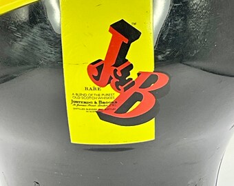 ビンテージの J & B アイスバケツ。黒と黄色のプラスチック製で、両側