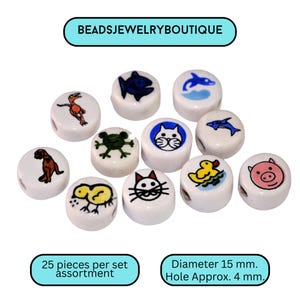 May include: A collection of white ceramic beads with various animal designs, including a dog, cat, pig, and duck. Each bead is approximately 15 mm in diameter with a 4 mm hole. The text "BEADSJEWELRYBOUTIQUE" is at the top.