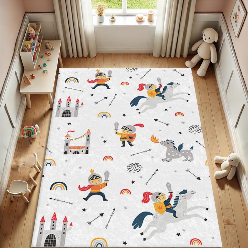 May include: A white play rug with a repeating pattern of knights, castles, dragons, and rainbows. The rug is perfect for a child's playroom or bedroom.