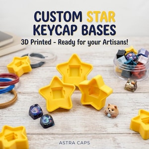May include: Yellow star-shaped 3D printed keycap bases with a central square opening. The image includes the text CUSTOM STAR KEYCAP BASES, 3D Printed - Ready for your Artisans!, and ASTRA CAPS, alongside various small artisan keycaps and coils.