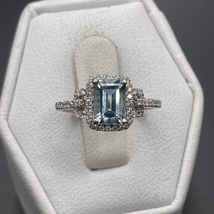 14 karat modern Zales, aquamarine and diamond ring