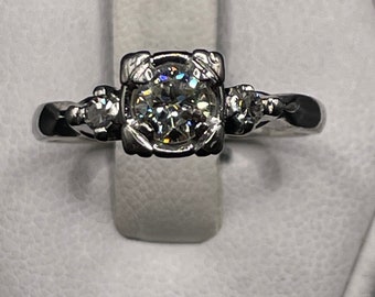 14 karat antique 2/3 carat mine cut diamond engagement ring.